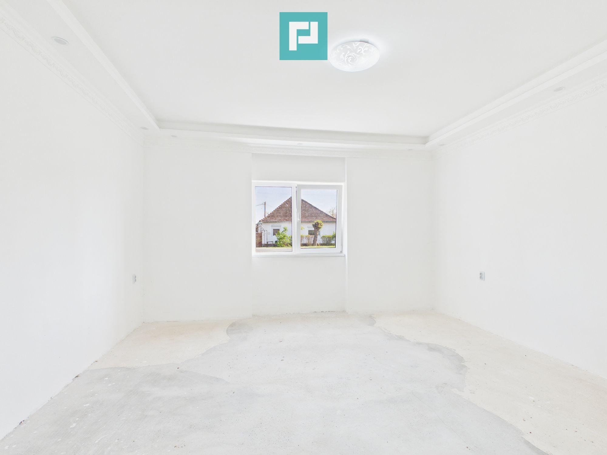 Casă renovată 4 camere si 1452 mp teren în Bătania - 4