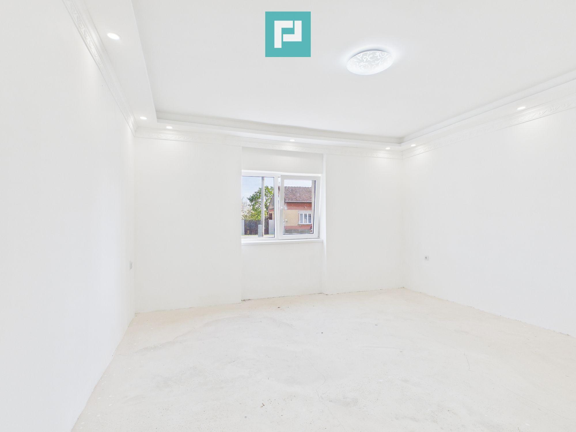 Casă renovată 4 camere si 1452 mp teren în Bătania - 5
