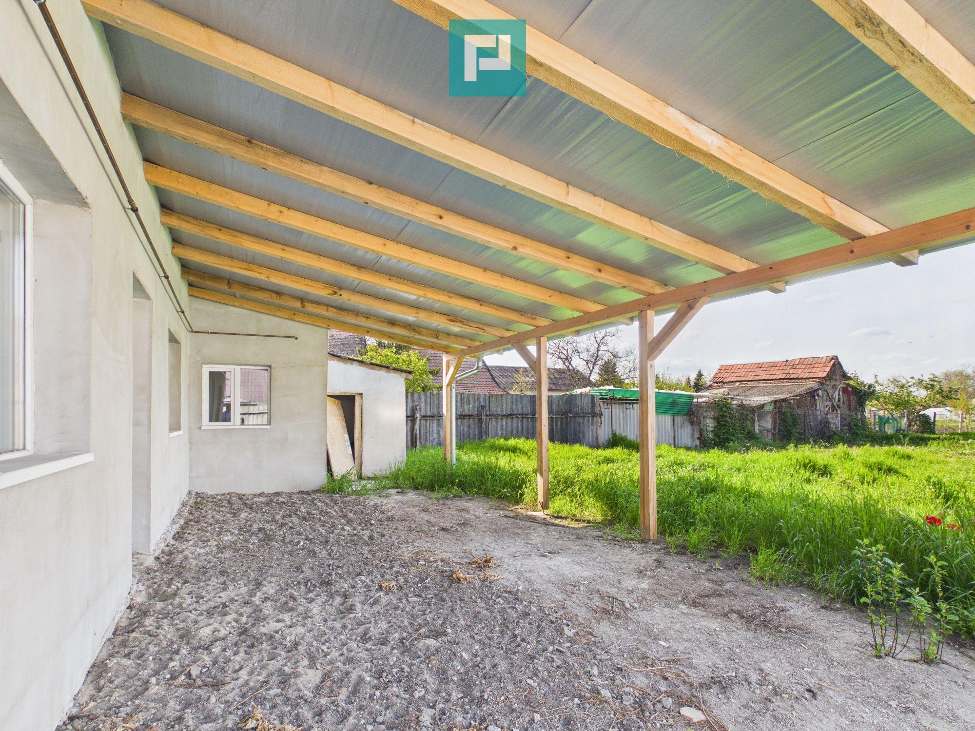 Casă renovată 4 camere si 1452 mp teren în Bătania - 14