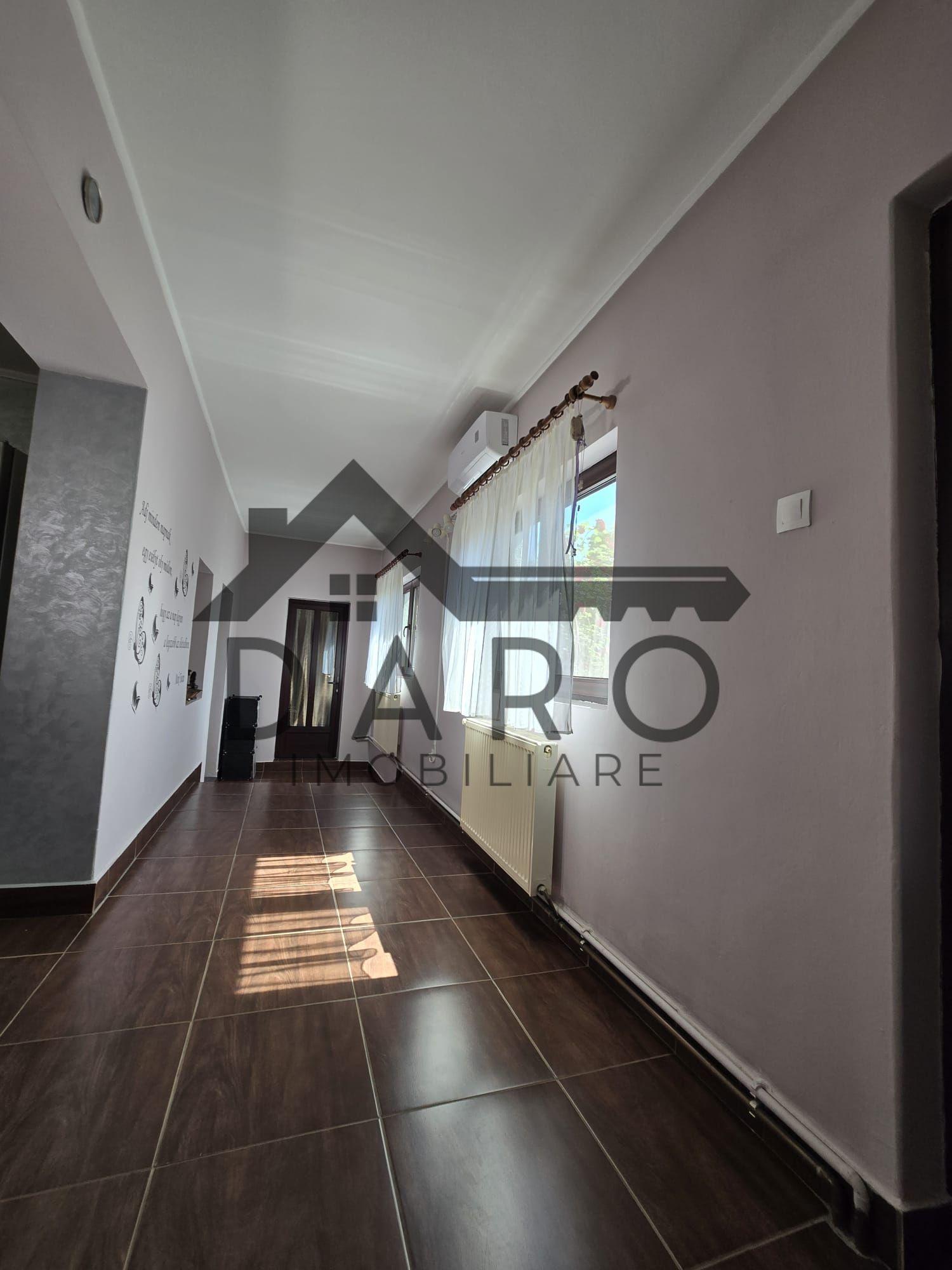 Casa in Livezeni , 140 mp utili , in centrul localitatii . - 17