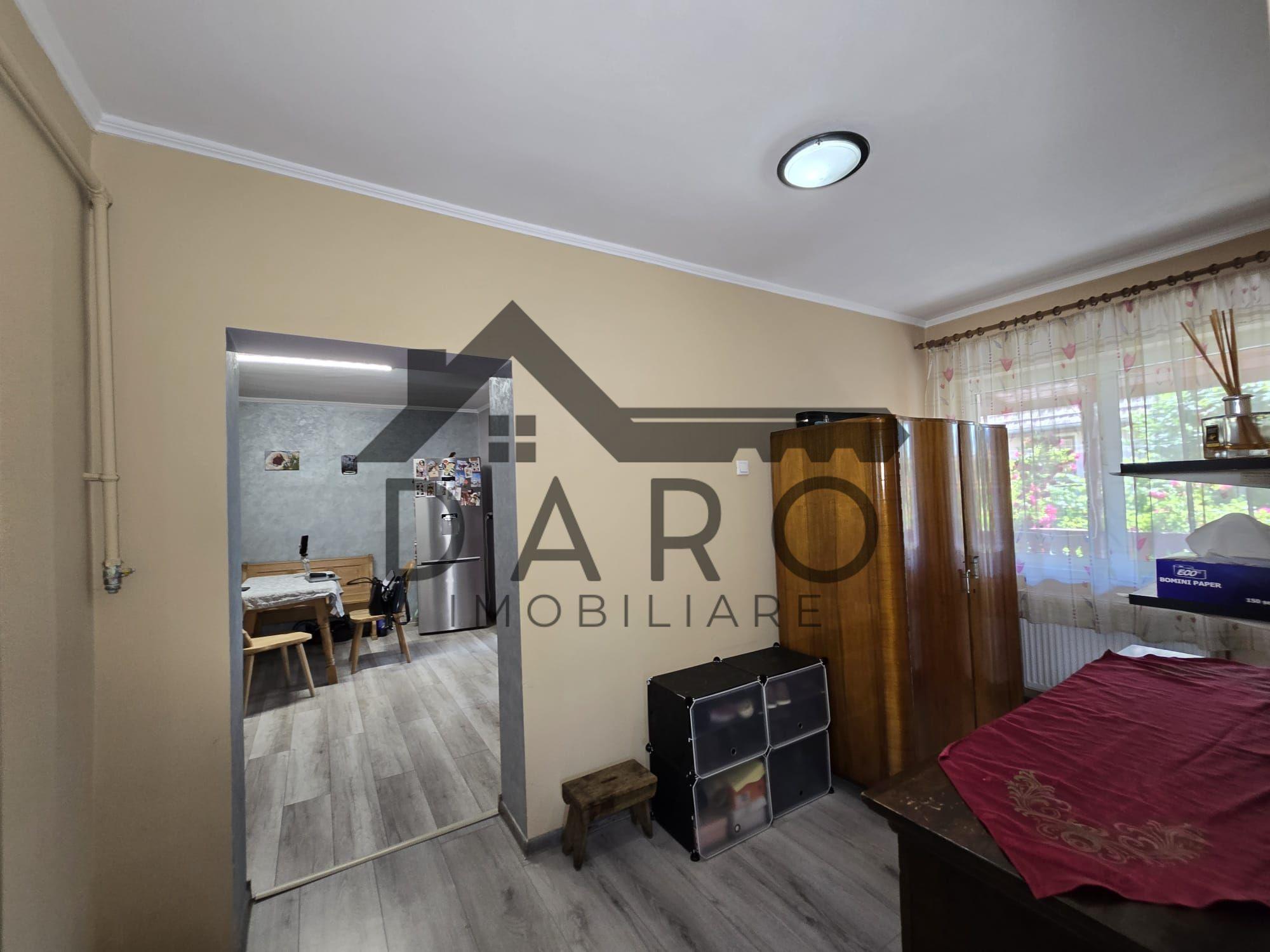 Casa in Livezeni , 140 mp utili , in centrul localitatii . - 14