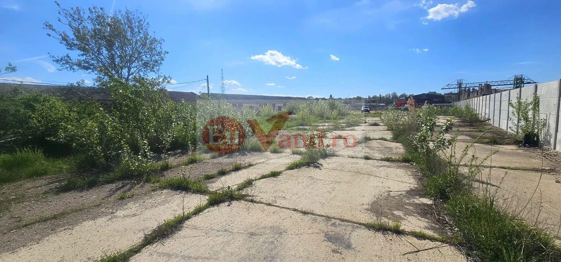 De vanzare - teren intravilan 2.077 mp - zona industriala - str. Macului - 7