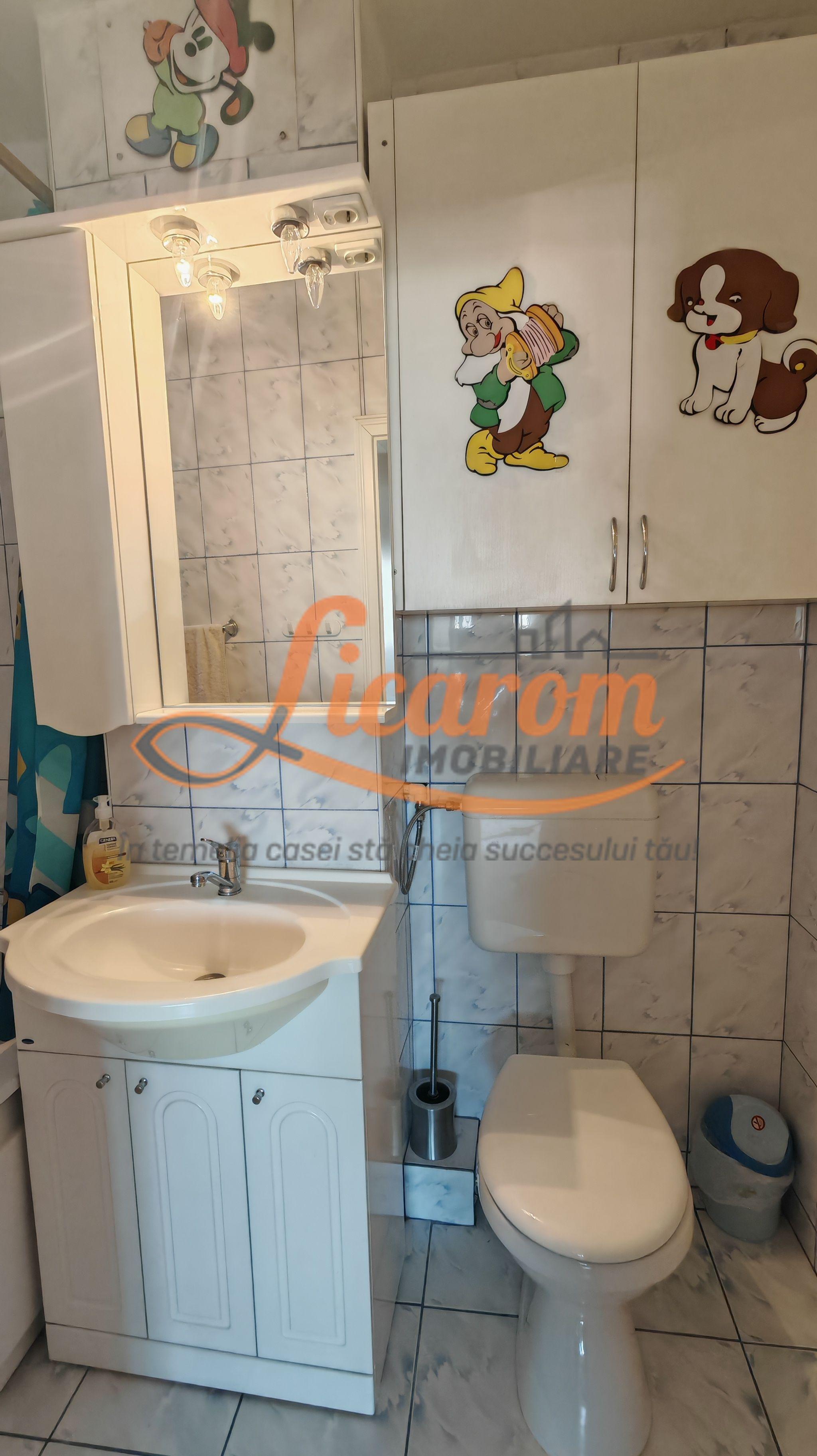 2 camere decomandat,BD Garii,etaj intermediar,pret pornire 103000 E - 25