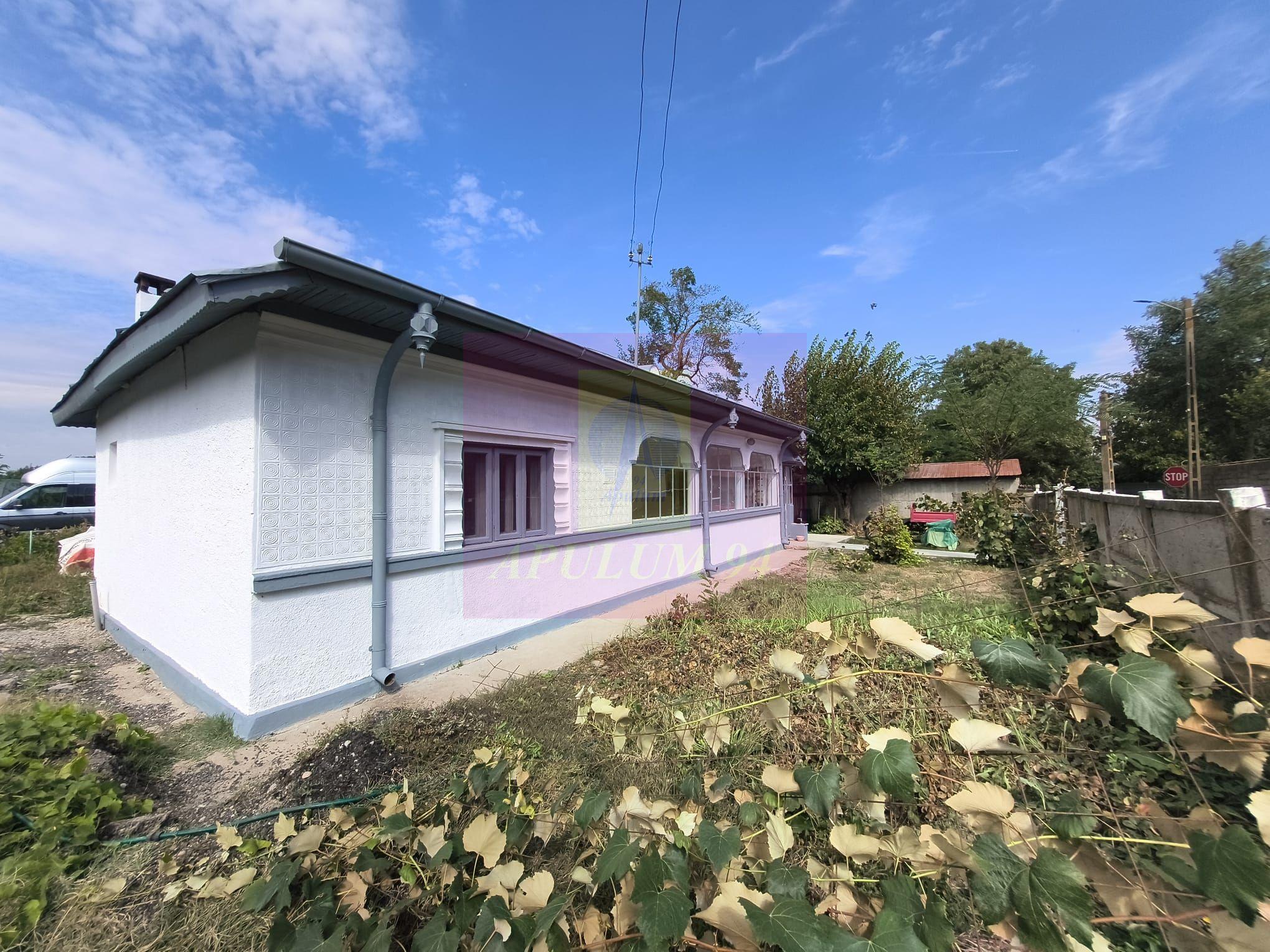 Casă cu farmec rustic și 500 mp, la 15 min de București - 2
