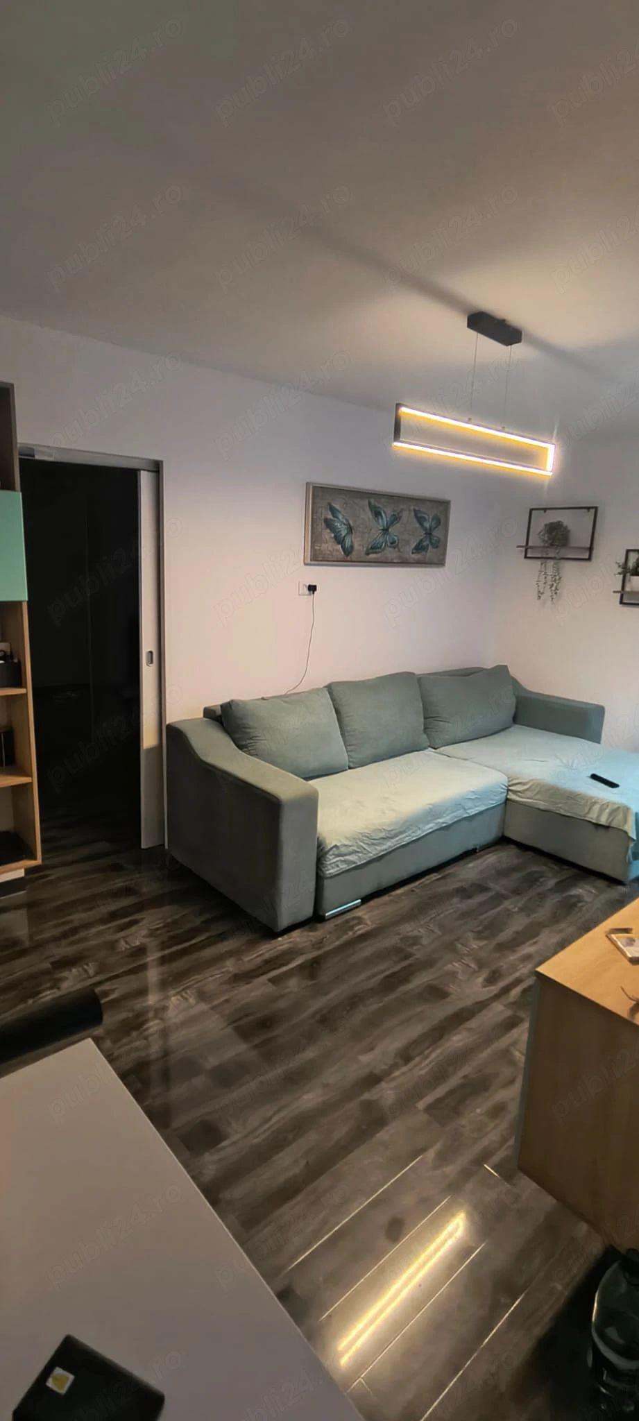 Apartament cu 2 camere, la parter, centrală proprie și aer condiționat